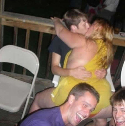 skinny guy making out with fat chick yellow dress